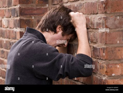 Banging Your Head Against A Brick Wall 5 Stock Photo Alamy
