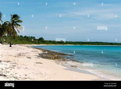 Photo Of A Cuban Beach With White Sands And Some Lapiez On The Shore