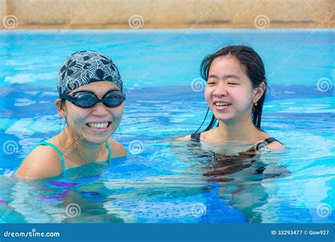 Two Asian Girls Are Having Fun In The Swimming Pool Stock Image Image Of Bikini Healthy 33293477
