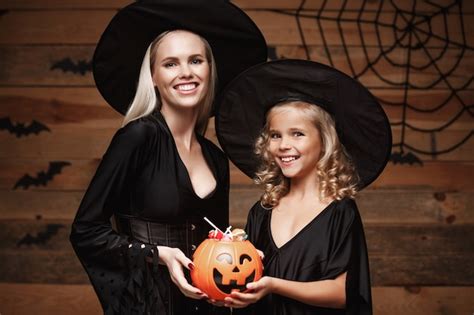 Premium Photo Beautiful Caucasian Mother And Her Daughter In Witch