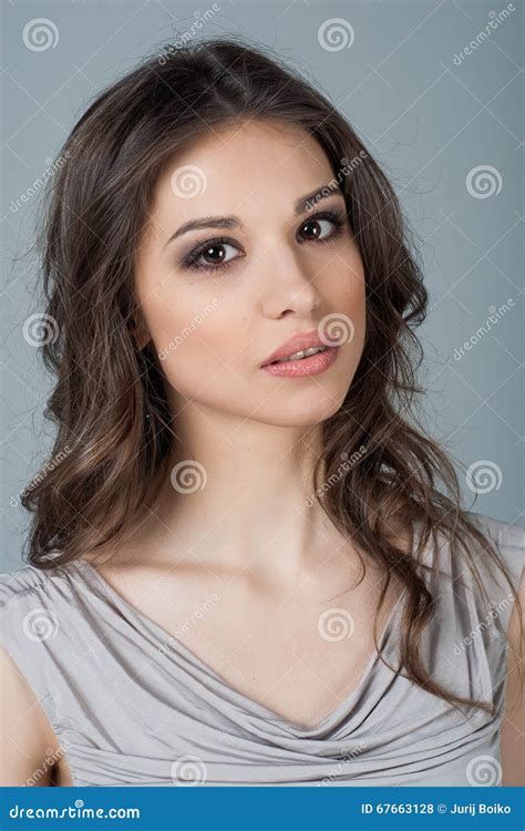Beautiful Woman Face Close Up Portrait Young Studio On Gray Natural