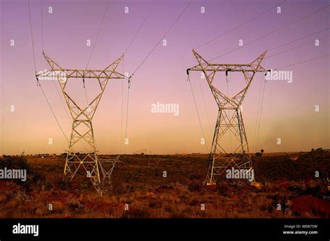 Sunset Landscape With Electrical Pylons Stock Photo Alamy