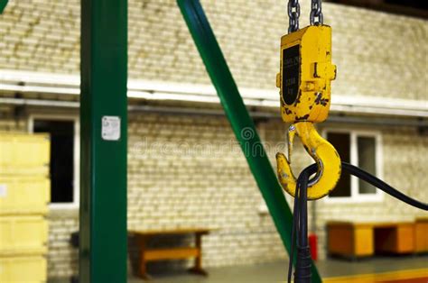 Crane Hook Of The Overhead Crane In The Workshop Of An Industrial Plant