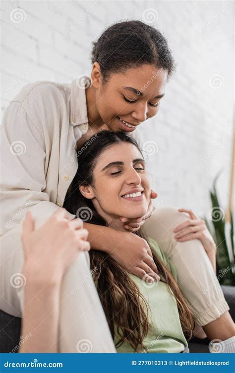 Joyful Lesbian And Multiracial Woman Hugging Stock Image Image Of Indoors Homosexual 277010313