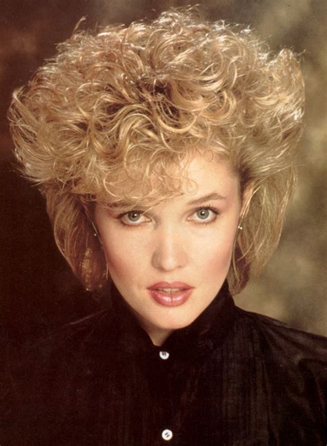 Maybe you would like to learn more about one of these? Permed and teased 1980s hairstyle
