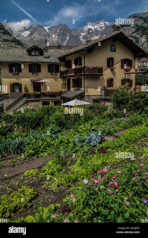 Italian Alps Flowery Village Stock Photo Alamy