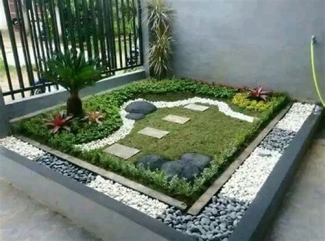 Tebar batu dan susun ubin balok di tengahnya agar bisa menjadi jalan. Inspirasi Taman Rumah Minimalis | berita dekorasi taman