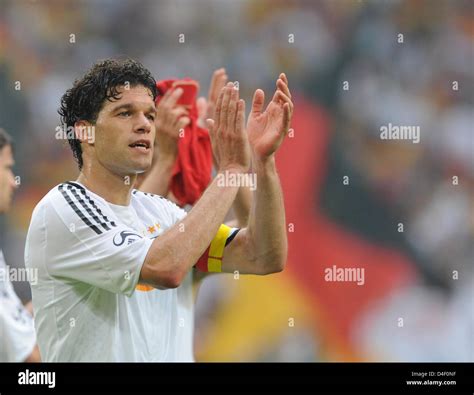 Germany's Michael Ballack applaudes the fans after friendly soccer
