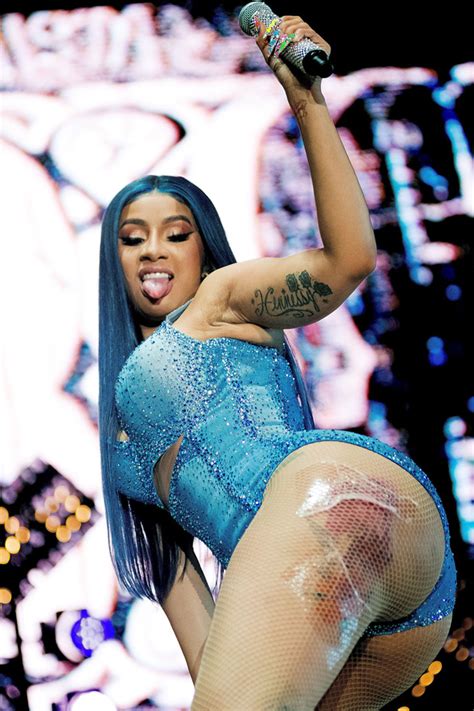 Cardi Bs Blue Denim Bodysuit And Thigh Chaps For Performance At Ca Fair