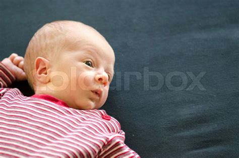 Cute Baby Lying On Its Back Stock Image Colourbox