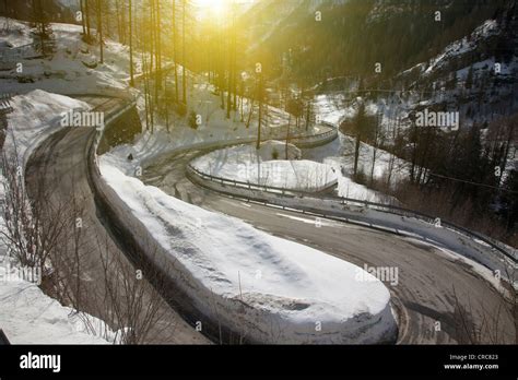 Winding Road In Snowy Landscape Stock Photo Alamy