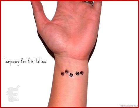 35 Pretty Paw Print Tattoos For Wrist