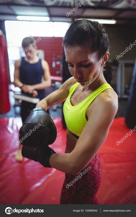 Female Boxer Wearing Boxing Gloves — Stock Photo © Wavebreakmedia