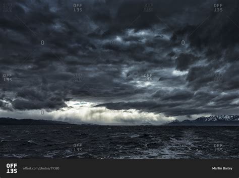 Stormy Sky Over The Ocean And Coast Of Antarctica Stock