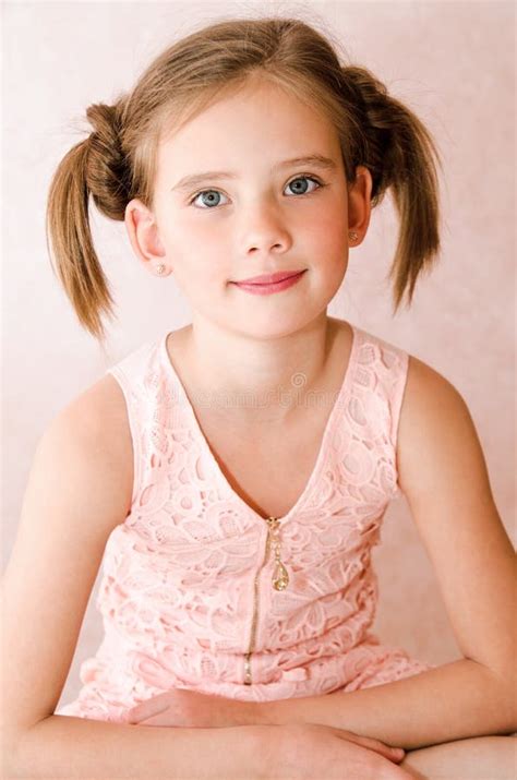 Portrait Of A Little Adorable Little Girl Smiling In