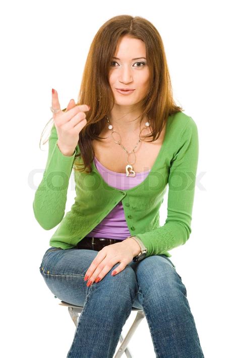 woman in green sign with her finger up stock image colourbox