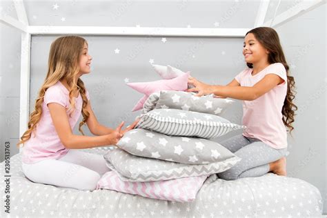 Girls Happy Best Friends In Pajamas With Pillows Sleepover Party