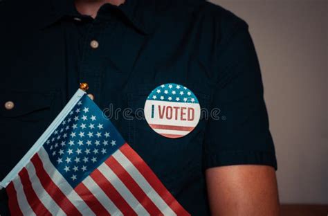 Anonymous Man With Election Campaign Vote Pin And The Usa American Flag