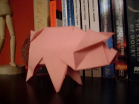 An Origami Pig · An Origami Pig · Origami On Cut Out Keep · Creation By