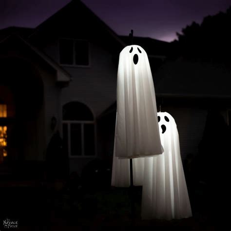 Easy Lighted Hanging Ghosts A Dollar Store Diy Diy Garden Decor