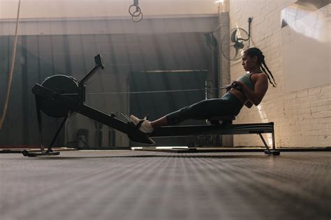 Level Up Your Training With This Rowing Machine Workout Guide - Form - US