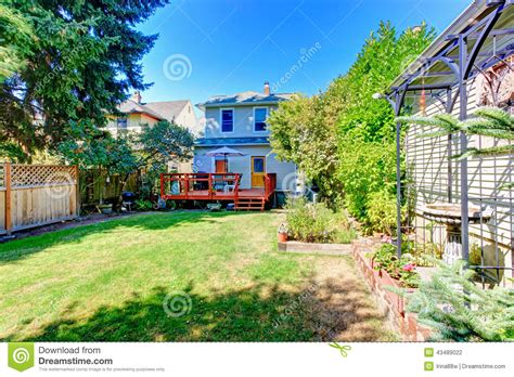 House With Backyard Walkout Deck And Patio Area Stock Photo Image Of