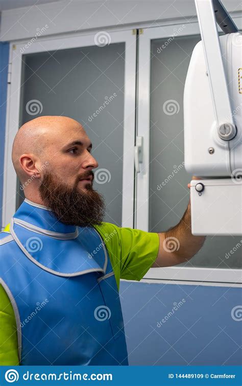 Maybe you would like to learn more about one of these? Veterinarian Using An X-ray Device With Lead Clothing Stock Image - Image of equipment ...