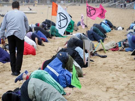 Extinction Rebellion Head In The Sand Protest At Manly Beach Daily