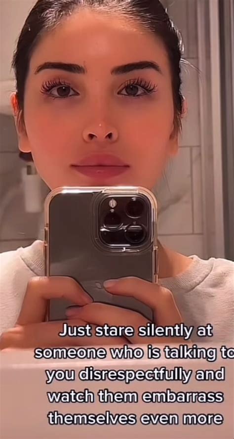 A Woman Taking A Selfie With Her Cell Phone In Front Of Her Face And The Caption Reads Just