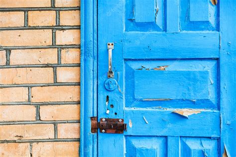 Premium Photo Details Of Closed Shabby Blue Wooden Door