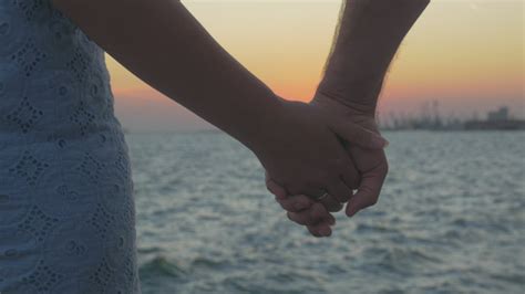 Couple Holding Hands During Sunset Free Stock Video