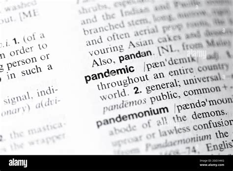 Pandemic Word Closeup In English Dictionary Stock Photo Alamy