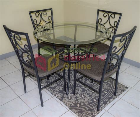 7 piece dining room table and chairs. 4 Piece Dining Table Set for sale in Mandeville Manchester - Furniture
