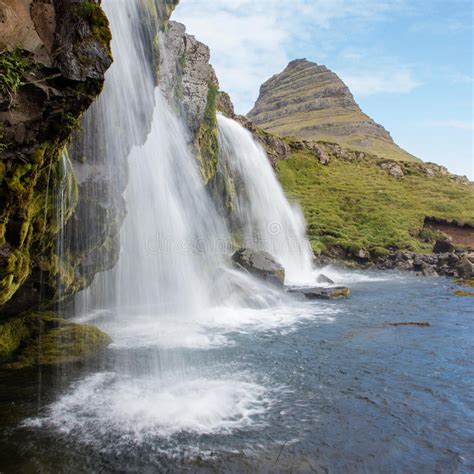 Kirkjufellsfoss Waterfall Near The Kirkjufell Mountain Stock Image