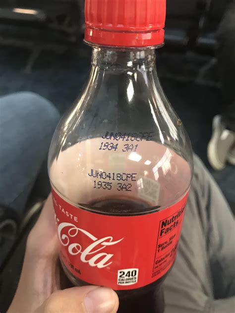 This coke bottle with two tags | Bottle lables, Bottle, Coke bottle