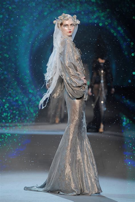 john galliano s fall 2009 show featured “beautifully iced maidens” and a snowstorm vogue