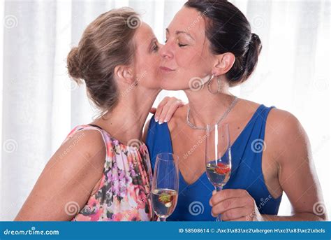 Two Attractive Woman Kissing Each Other Stock Photo Image