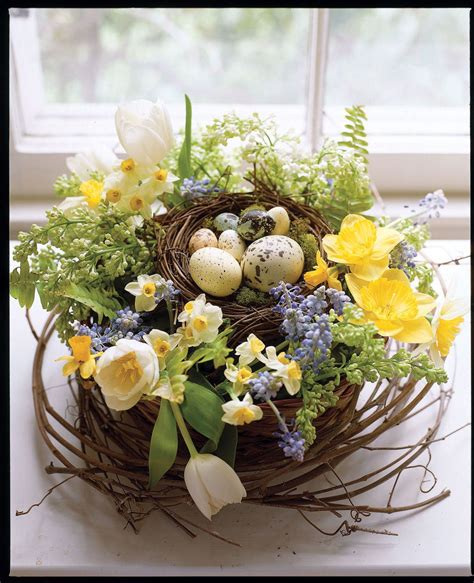 Flowers And Eggs Real And Artificial Rest In A Birds Nest Filled