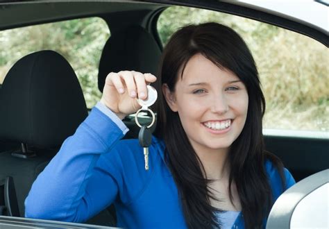 Premium Photo Radiant Teenager Holding Car Keys Sitting In Her New Car