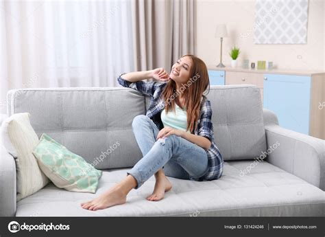 Girl Relaxing On Couch Stock Photo By Belchonock