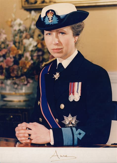 A young princess anne is seen here with a bouquet of flowers. Anne Princess Royal Autographed Portrait Signed
