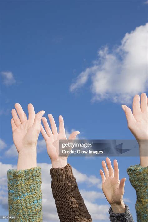 Closeup Of Human Hands Reaching Upwards High Res Stock Photo Getty Images