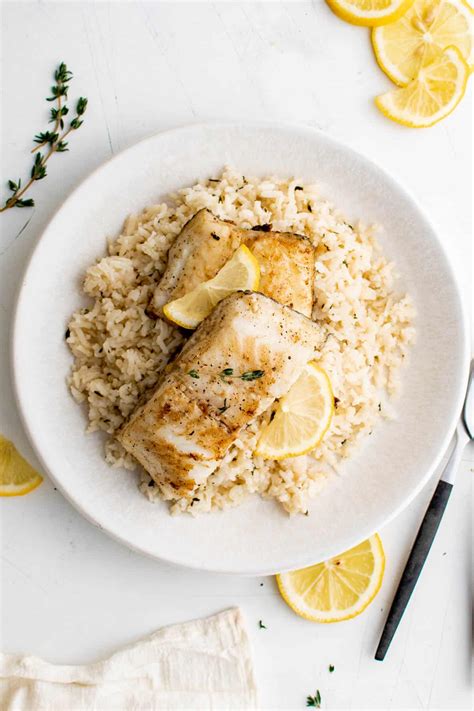 Pan Seared Chilean Sea Bass With Garlic And Herb Rice Spoonful Of Flavor