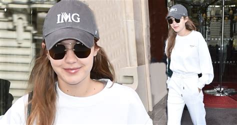 Gigi Hadid Dons Low Key White Tracksuit And Baseball Cap As She Leaves