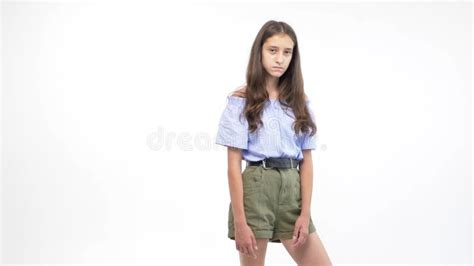 Isolated White Background Beautiful Teenager Girl In Shorts And A