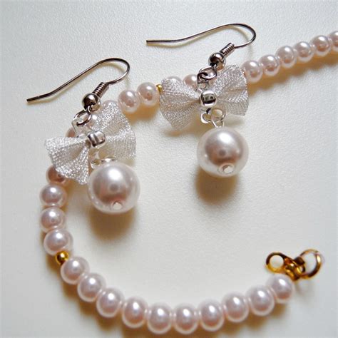 Petite Pearl And Silver Mesh Bow Earrings