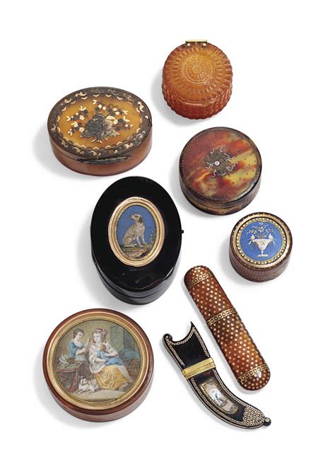 a group of tortoiseshell snuff boxes and etuis