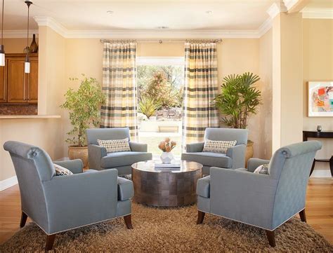 These overstuffed distressed leather chairs do the trick here. four chairs living room traditional with coffee table ...