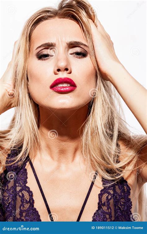 Emotions And Feelings Concept Beautiful Blond Lady Portrait In Lingerie While Getting An