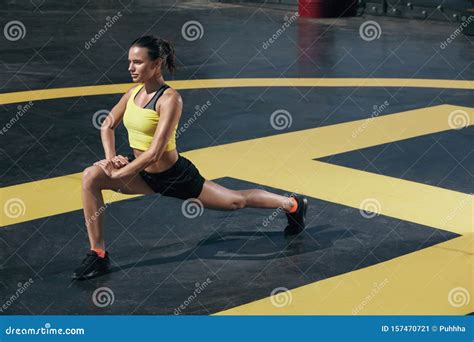 Fitness Woman Stretching Legs Before Workout Outdoors Stock Image